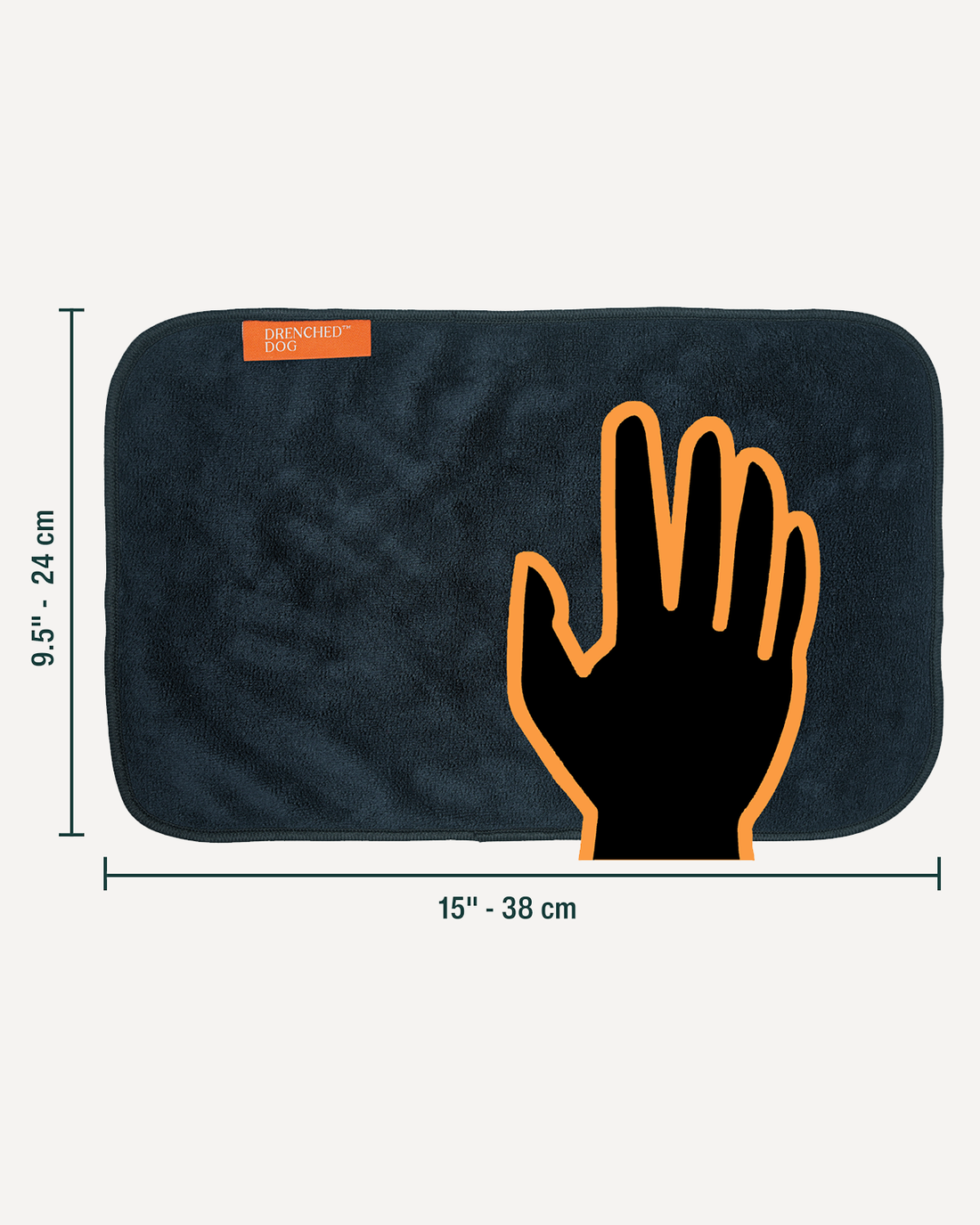 A fluffy Shiba Inu dog extends its paw while a person uses a black Drenched Dog microfiber towel to dry it. A matching rectangular towel is displayed in the top left corner, showing the product's texture and branding.