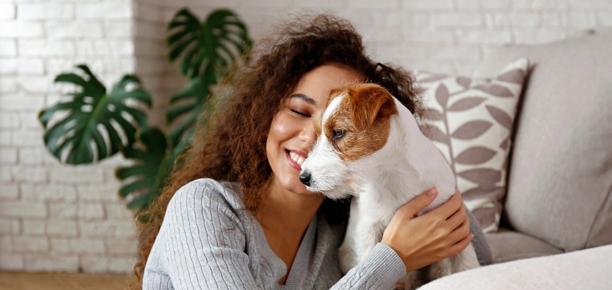 Girl hugging a dog